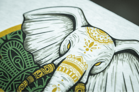 a close up of an dtg print of an elephant with tusk