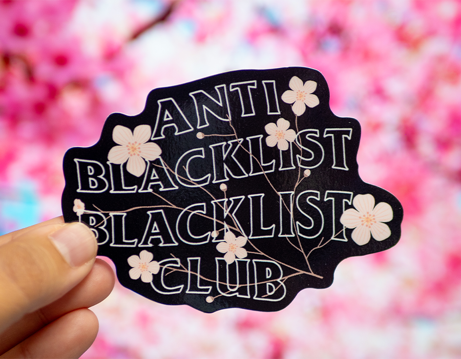 Anti Blacklist Blacklist Club custom die cut sticker with white outlined typography, pink floral artwork and black background.