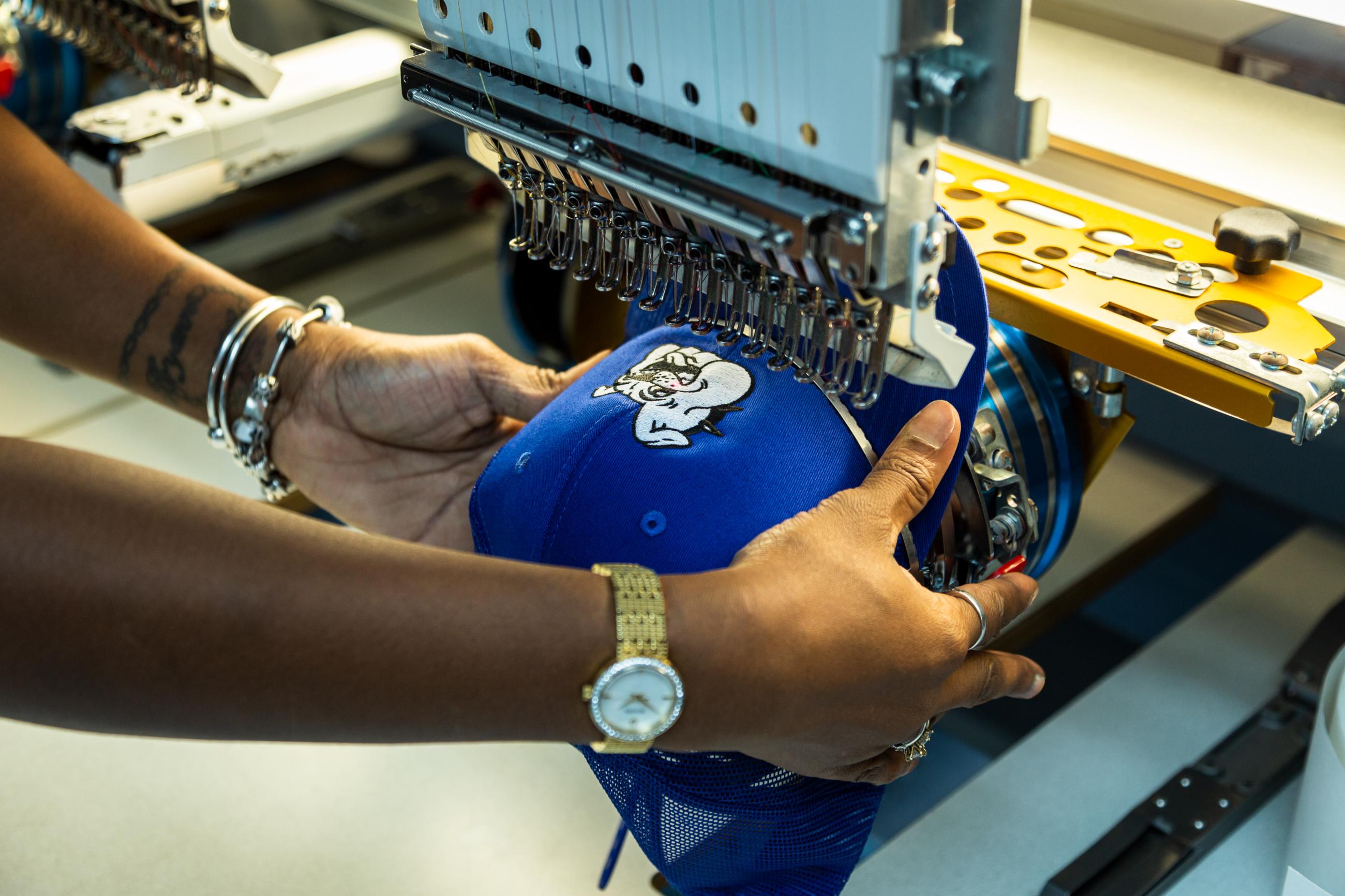 Embroidery Operator Action Shot at Hittn' Skins in Orlando, FL